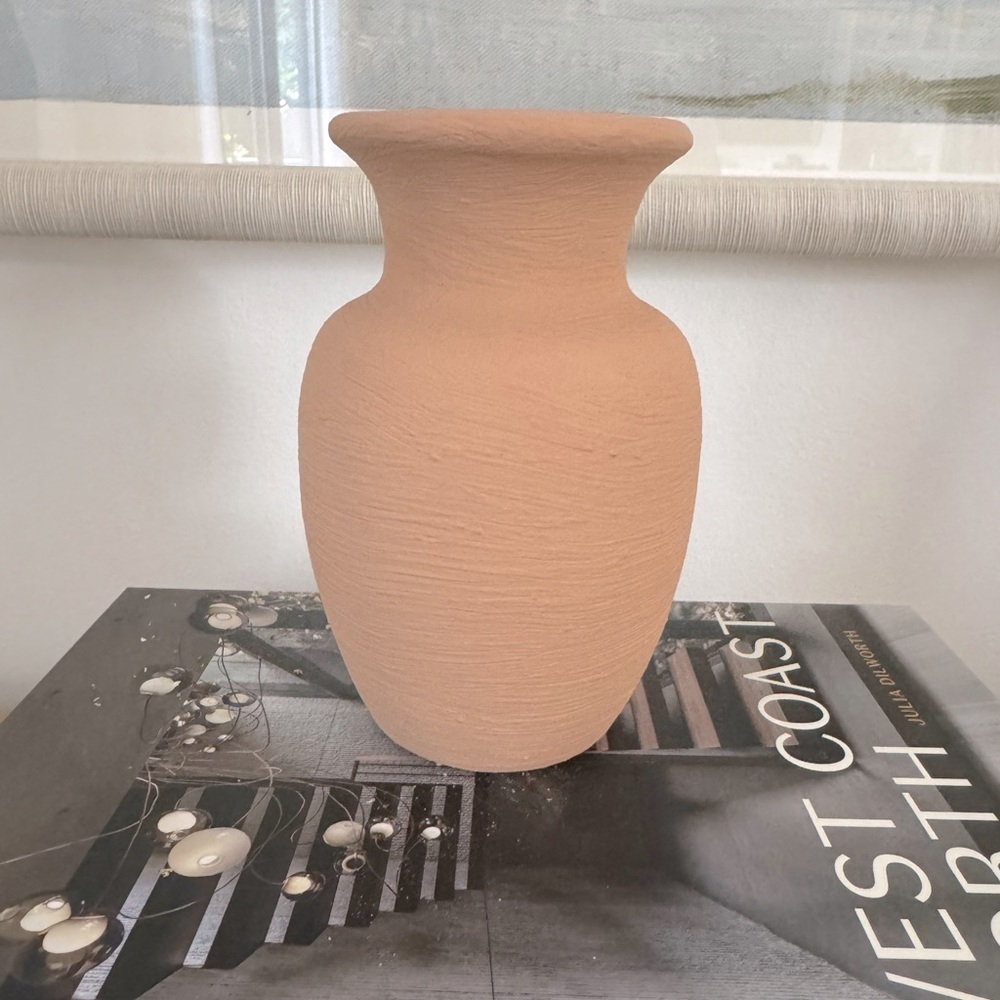 Small ceramic re-finished vase